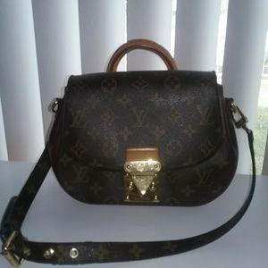 Louis Vuitton Classic Handbag with leather